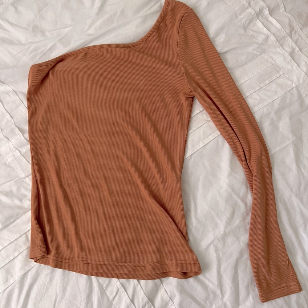 Reversible one sleeved top